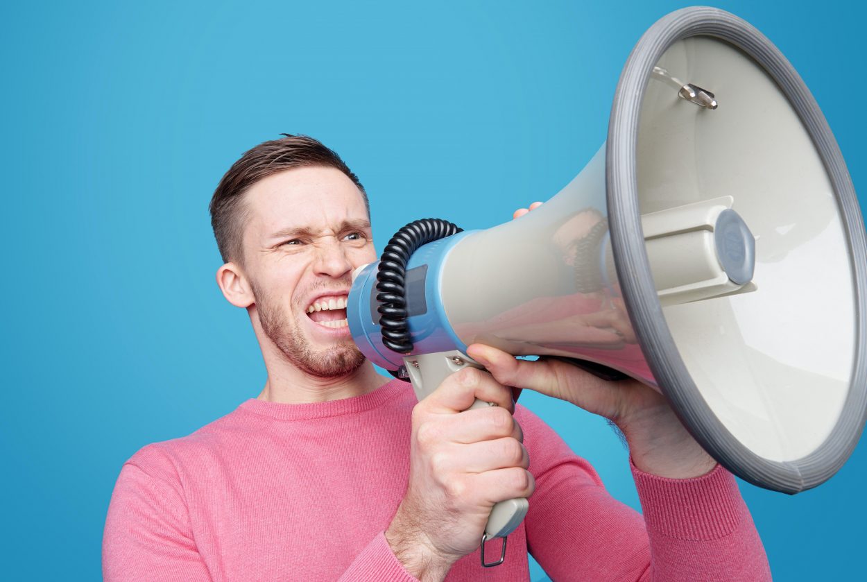 man-talking-on-a-megaphone-3851261